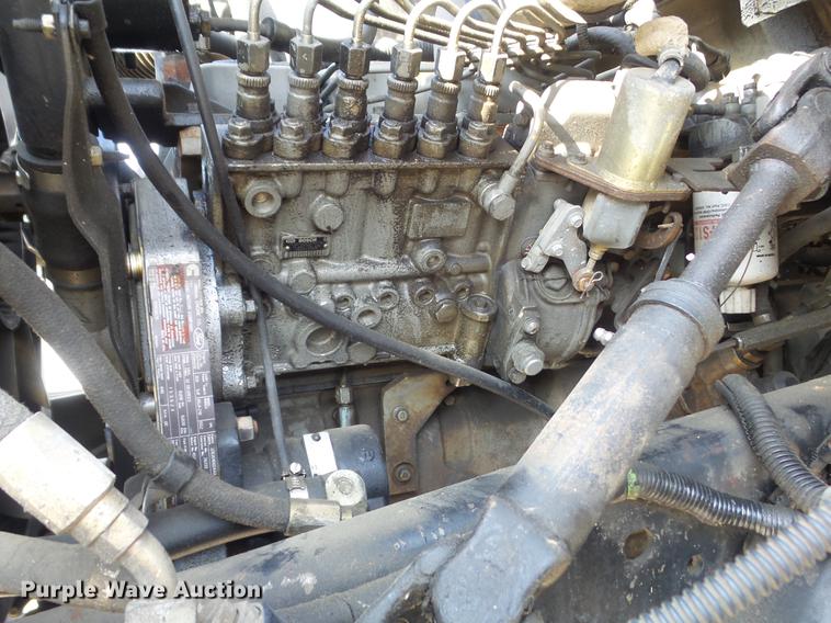 image for item DC7358 1995 Ford F800 service truck with crane