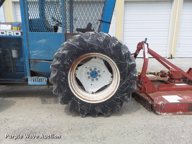 image for item DD7227 1994 Ford 7740 MFWD tractor