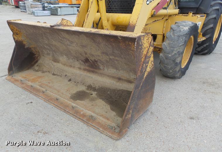 image for item DD7248 2000 John Deere 310SE backhoe