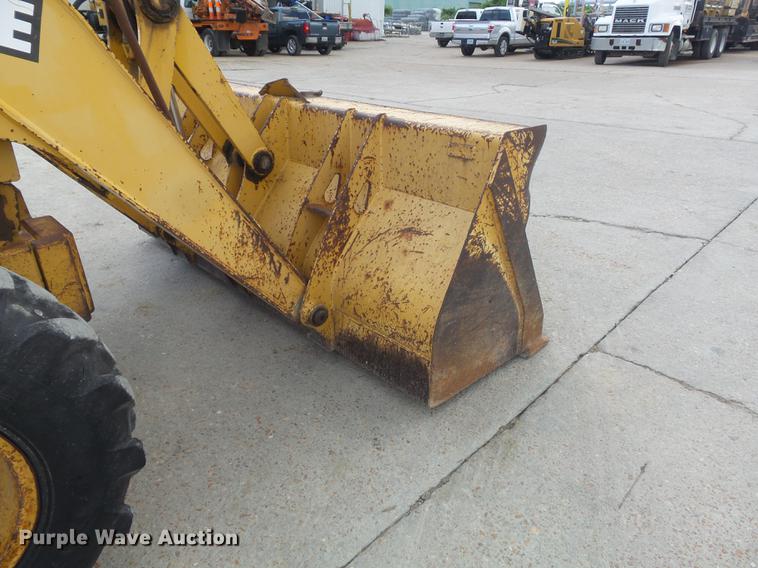 image for item DD7248 2000 John Deere 310SE backhoe