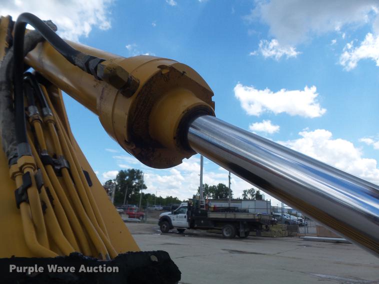 image for item DD7248 2000 John Deere 310SE backhoe