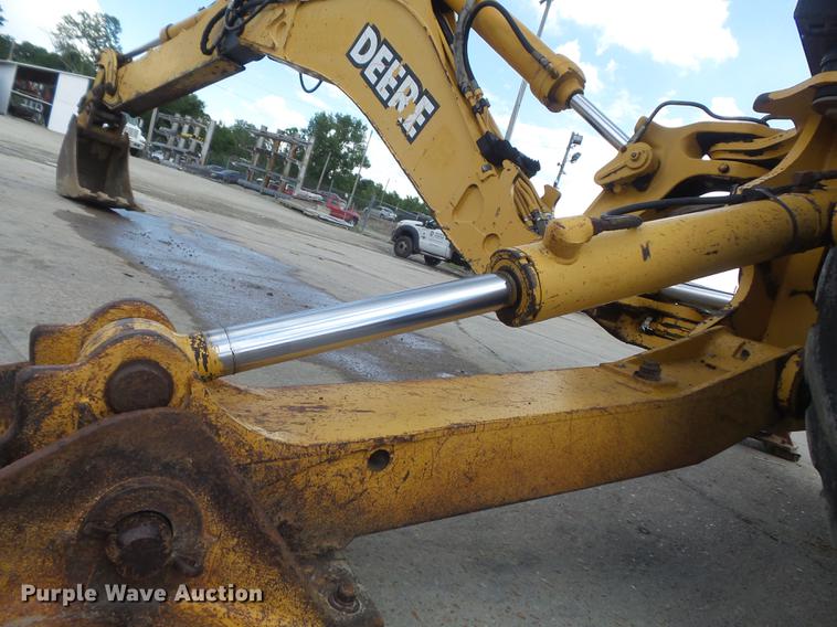 image for item DD7248 2000 John Deere 310SE backhoe