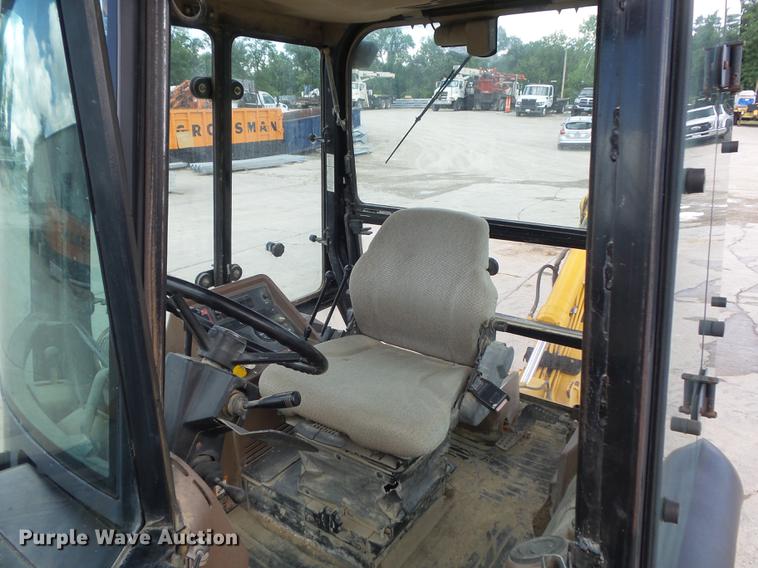 image for item DD7248 2000 John Deere 310SE backhoe