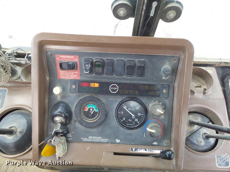 image for item DD7248 2000 John Deere 310SE backhoe