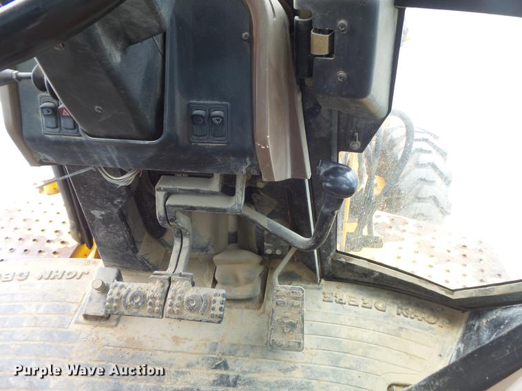 image for item DD7248 2000 John Deere 310SE backhoe