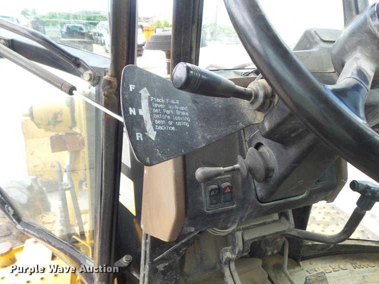 image for item DD7248 2000 John Deere 310SE backhoe