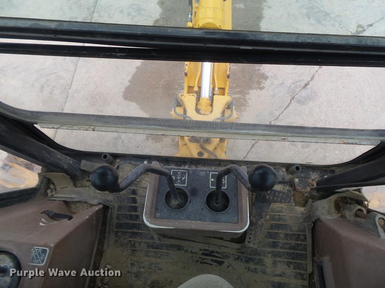 image for item DD7248 2000 John Deere 310SE backhoe