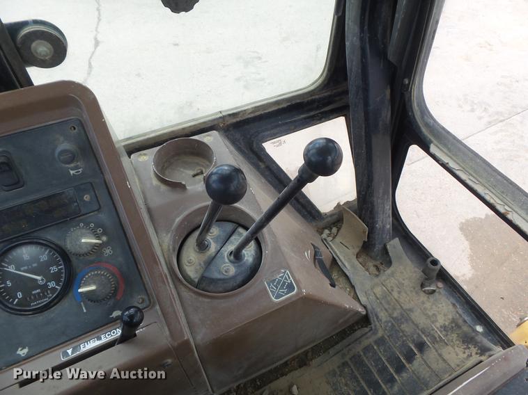 image for item DD7248 2000 John Deere 310SE backhoe