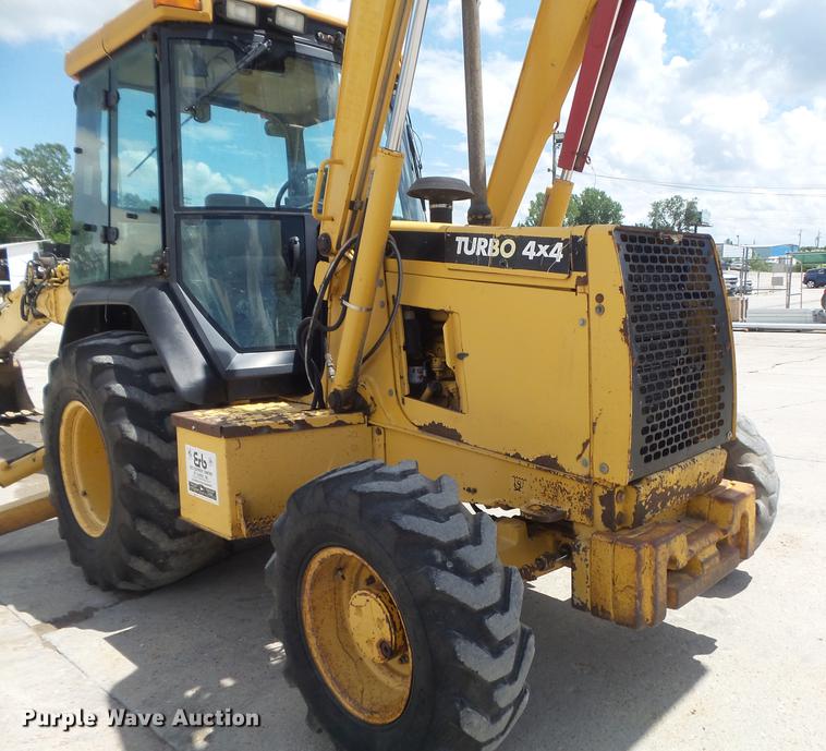 image for item DD7248 2000 John Deere 310SE backhoe
