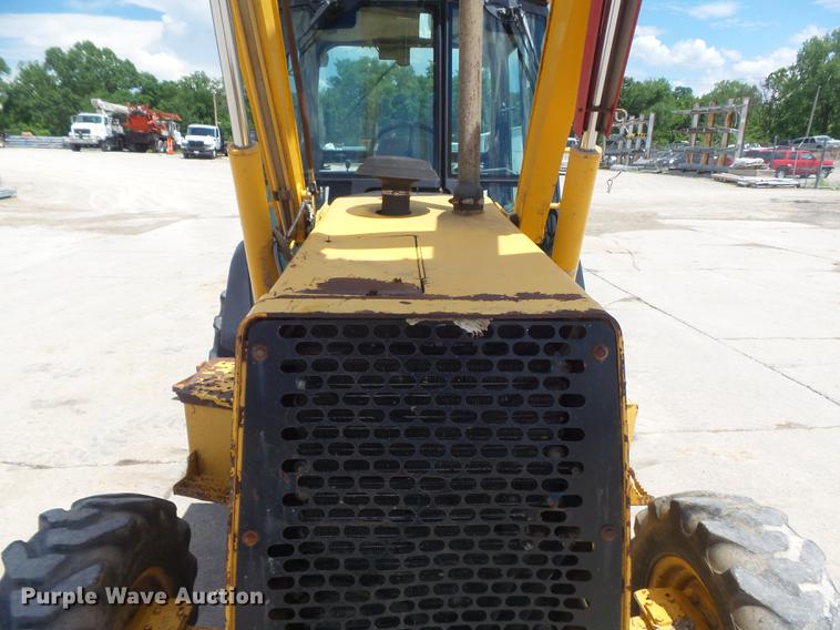 image for item DD7248 2000 John Deere 310SE backhoe