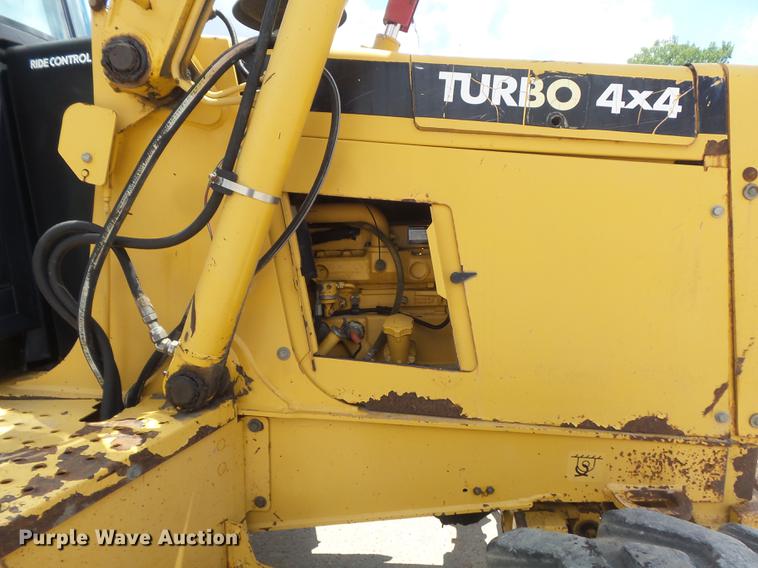 image for item DD7248 2000 John Deere 310SE backhoe