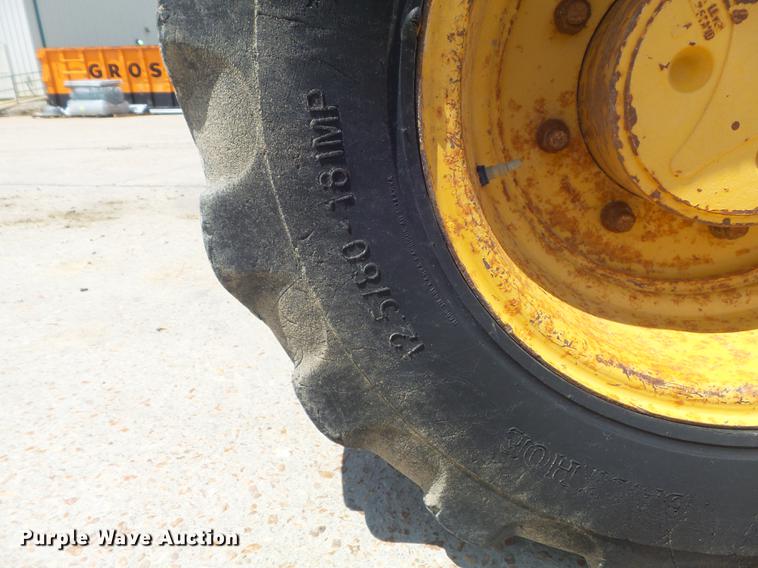 image for item DD7248 2000 John Deere 310SE backhoe