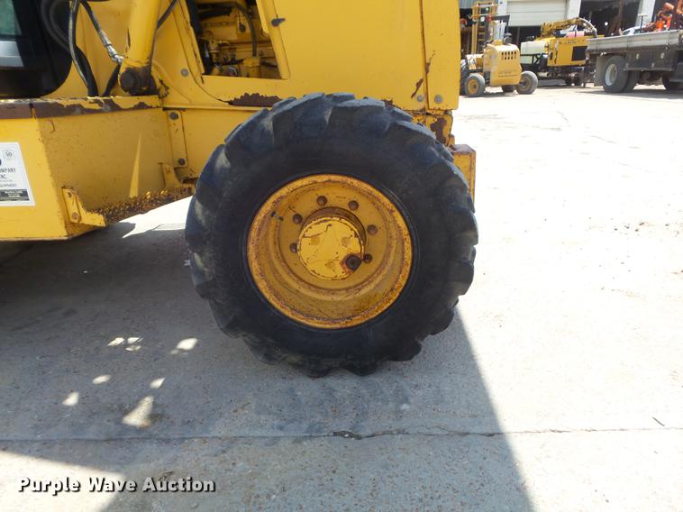 image for item DD7248 2000 John Deere 310SE backhoe