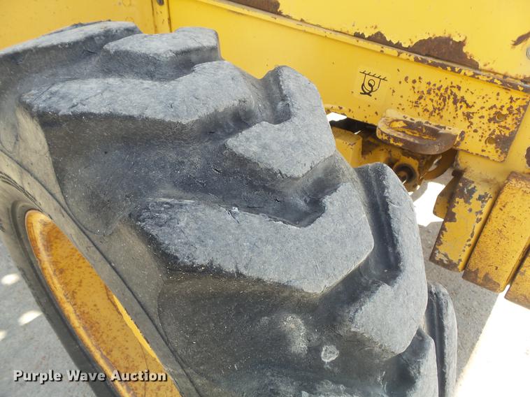 image for item DD7248 2000 John Deere 310SE backhoe