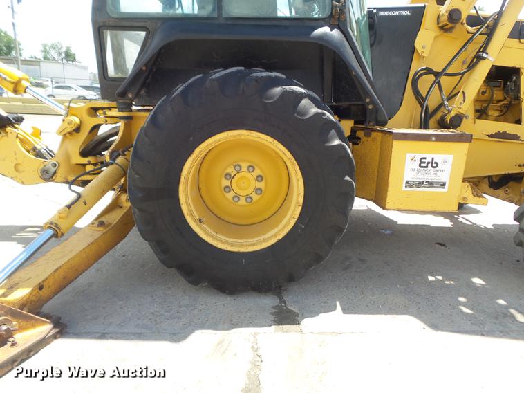 image for item DD7248 2000 John Deere 310SE backhoe