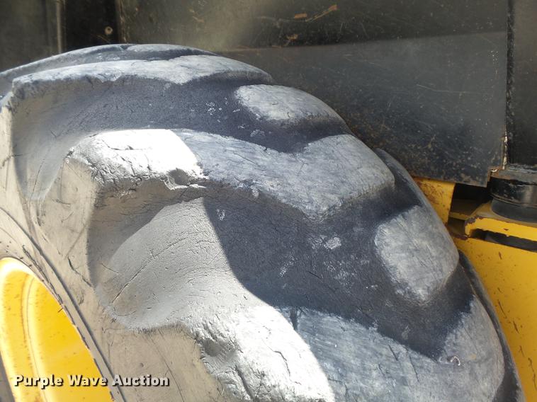 image for item DD7248 2000 John Deere 310SE backhoe