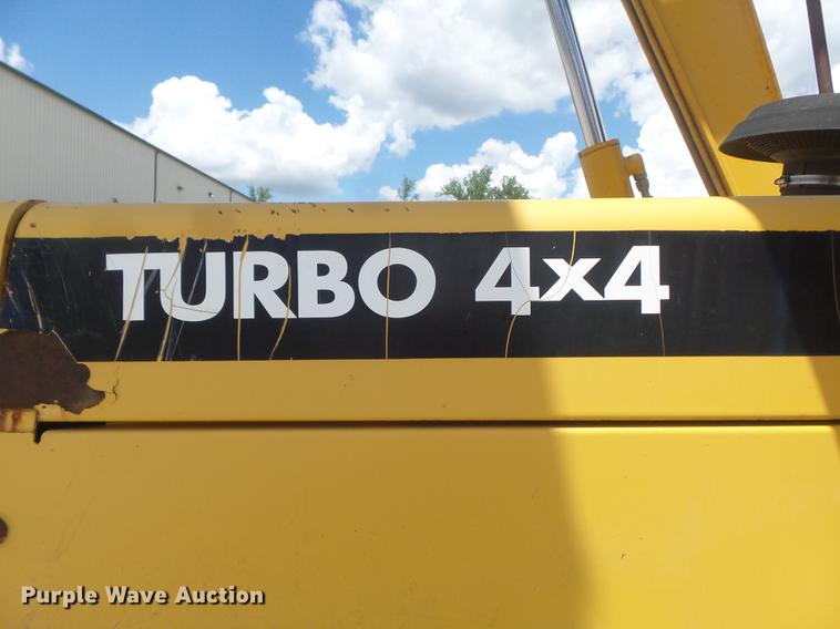 image for item DD7248 2000 John Deere 310SE backhoe