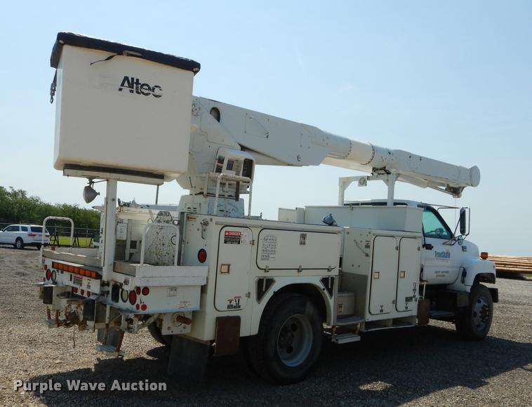 image for item DE1800 1999 GMC C7500 bucket truck