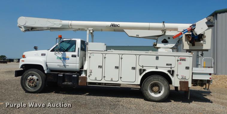 image for item DE1800 1999 GMC C7500 bucket truck