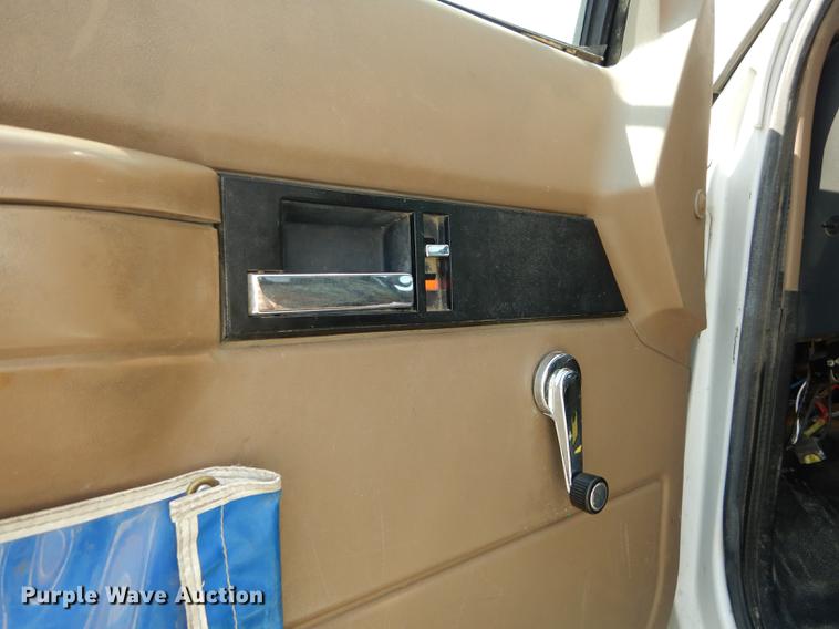 image for item DE1800 1999 GMC C7500 bucket truck