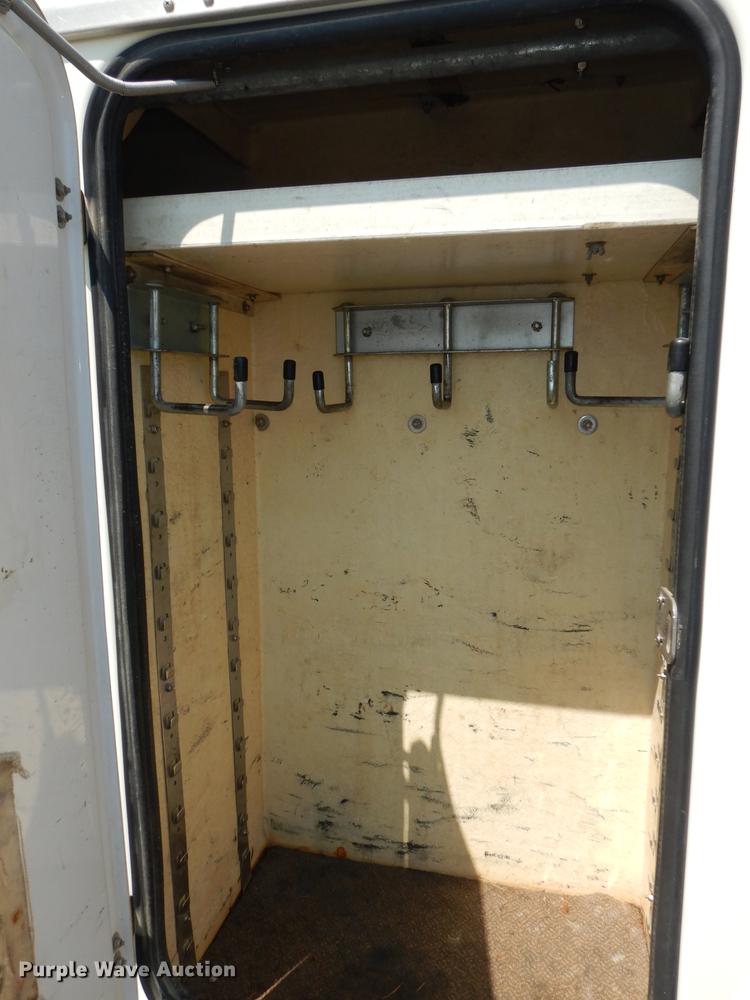 image for item DE1800 1999 GMC C7500 bucket truck