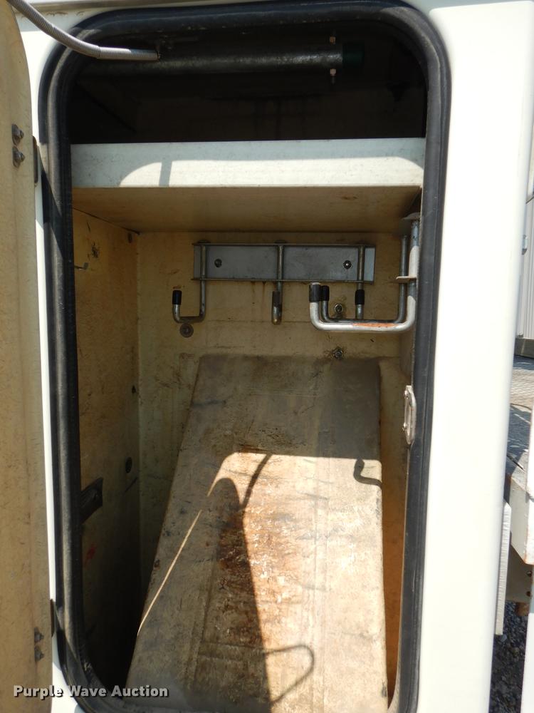 image for item DE1800 1999 GMC C7500 bucket truck