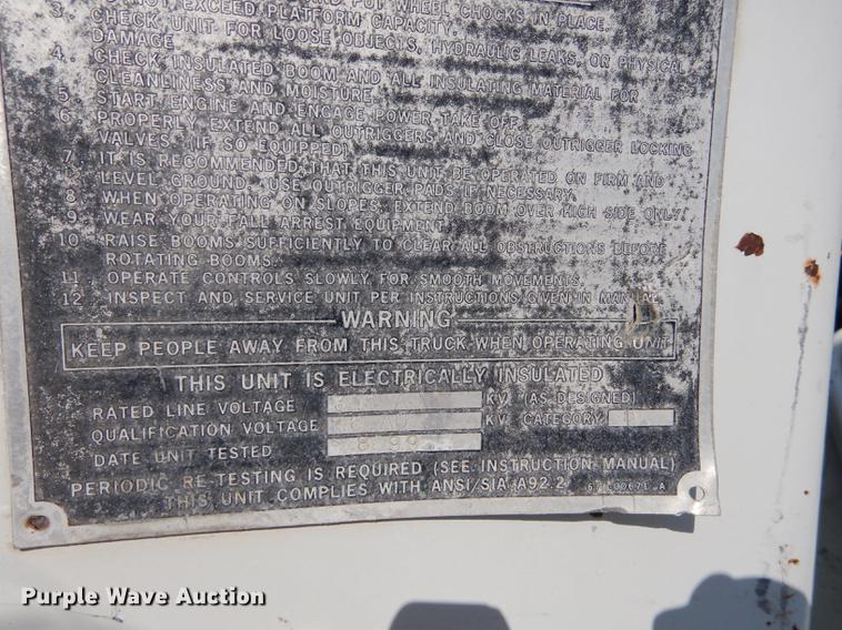 image for item DE1800 1999 GMC C7500 bucket truck