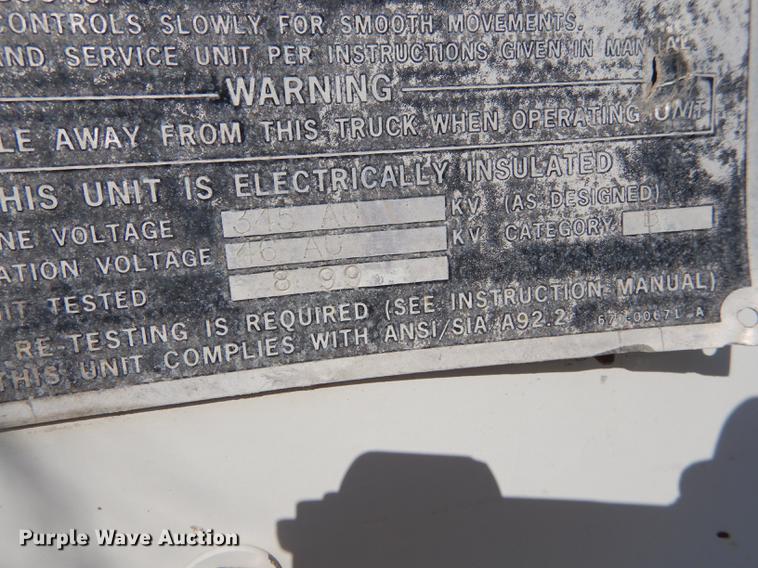 image for item DE1800 1999 GMC C7500 bucket truck