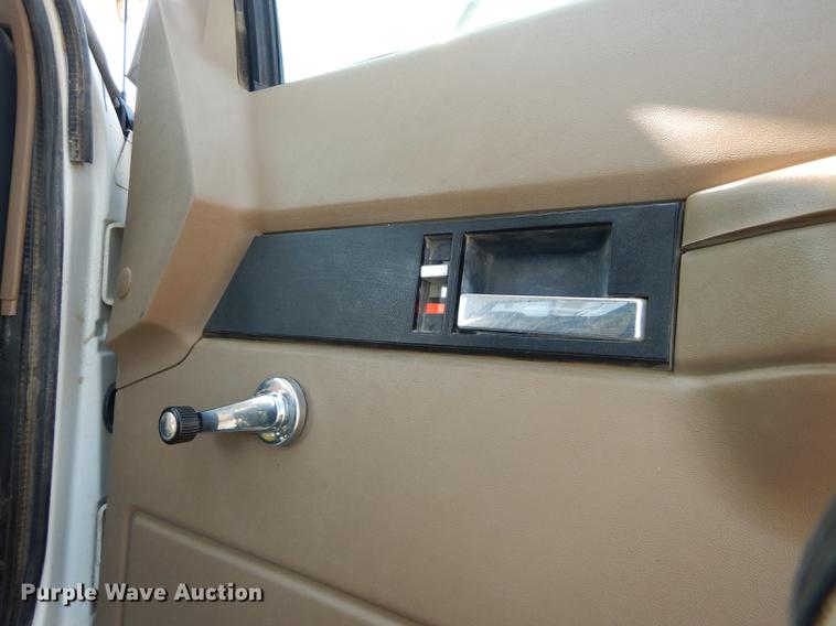 image for item DE1800 1999 GMC C7500 bucket truck