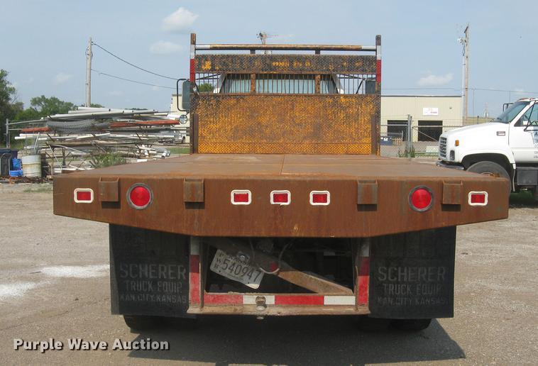 image for item DE2952 1992 GMC TopKick 6500 flat dump bed truck