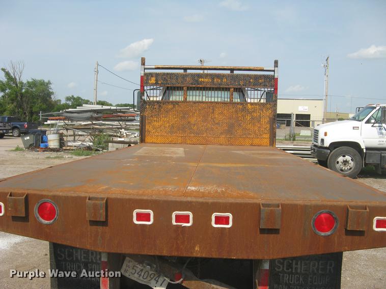 image for item DE2952 1992 GMC TopKick 6500 flat dump bed truck