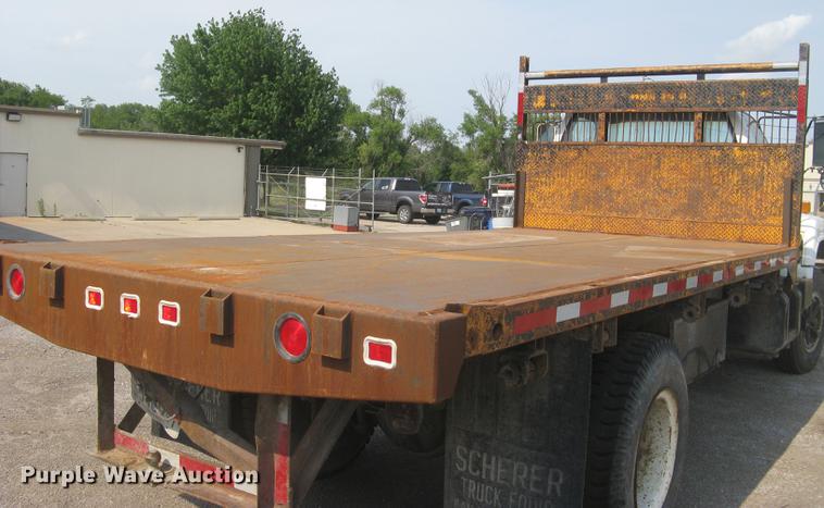 image for item DE2952 1992 GMC TopKick 6500 flat dump bed truck