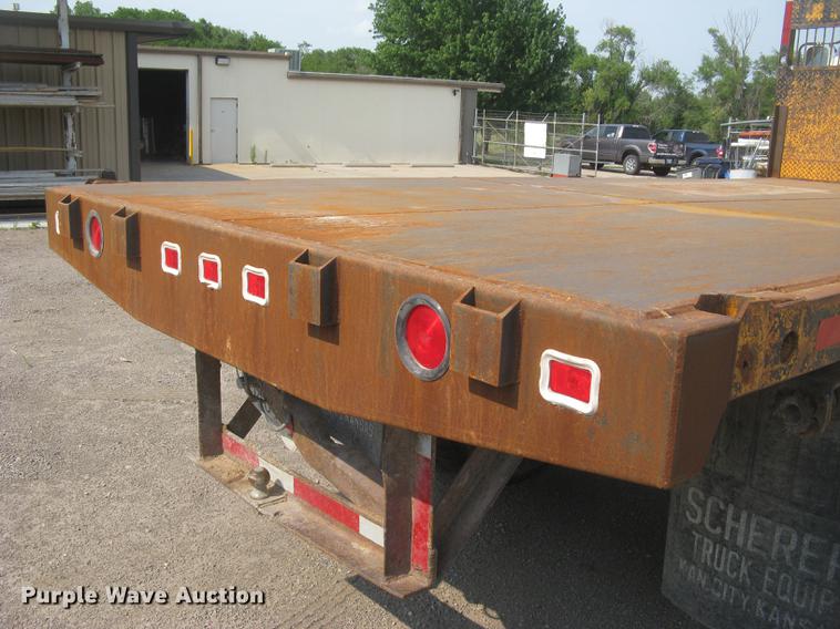 image for item DE2952 1992 GMC TopKick 6500 flat dump bed truck