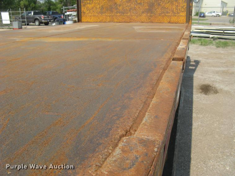 image for item DE2952 1992 GMC TopKick 6500 flat dump bed truck