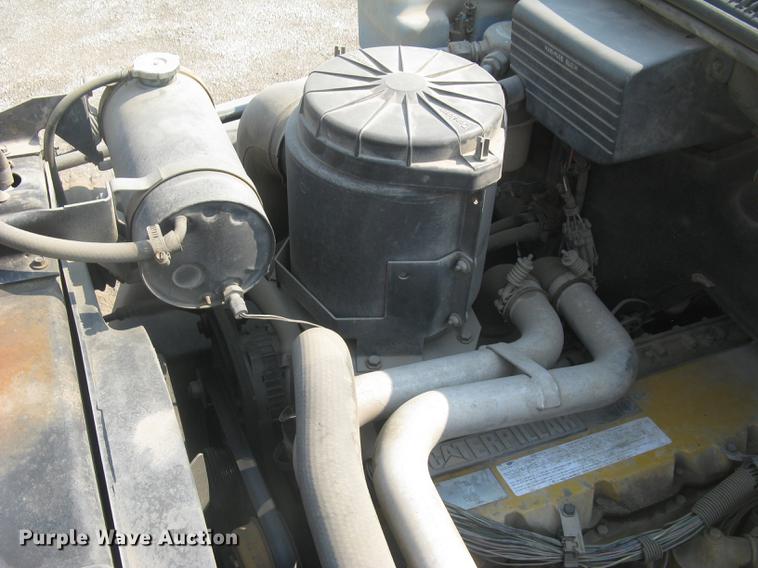 image for item DE2952 1992 GMC TopKick 6500 flat dump bed truck