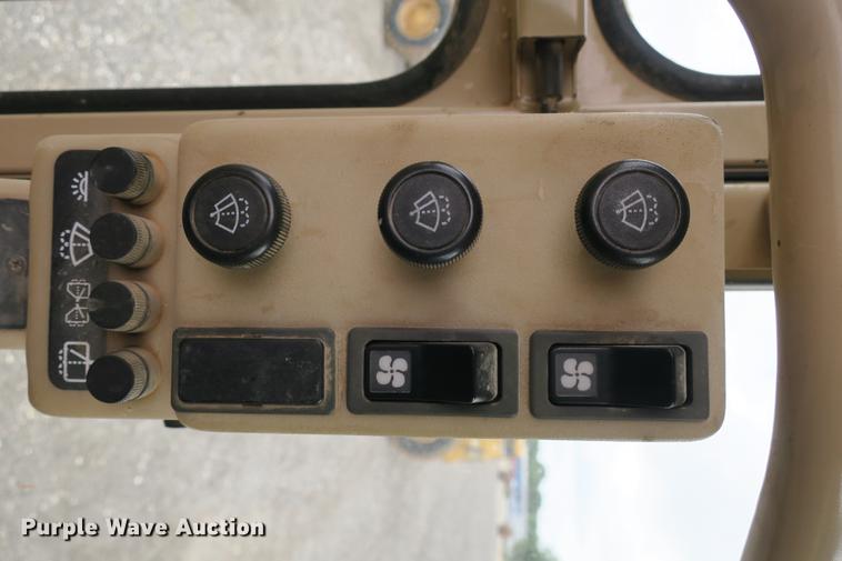 image for item DE3753 1999 Caterpillar 12H motor grader