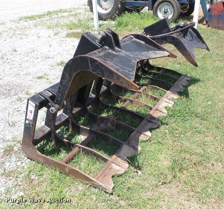 image for item EI9825 Tri-L skid steer root grapple bucket