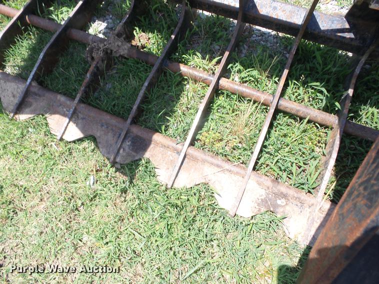 image for item EI9825 Tri-L skid steer root grapple bucket