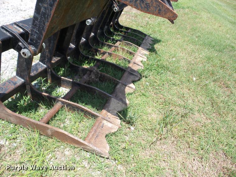 image for item EI9825 Tri-L skid steer root grapple bucket