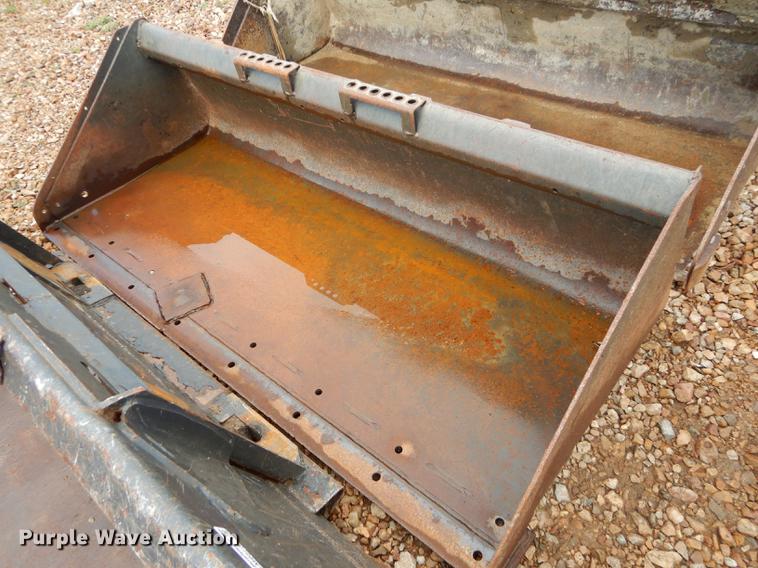 Bobcat 74"W low profile skid steer bucket in Olathe, KS Item EM9552 sold Purple Wave