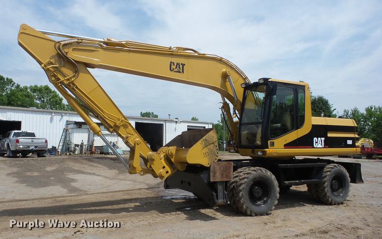 image for item K6275 1998 Caterpillar M318 excavator