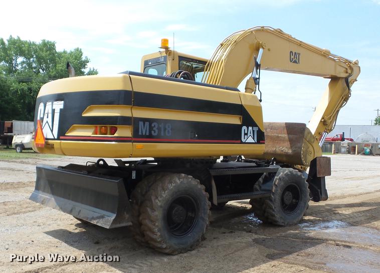 image for item K6275 1998 Caterpillar M318 excavator