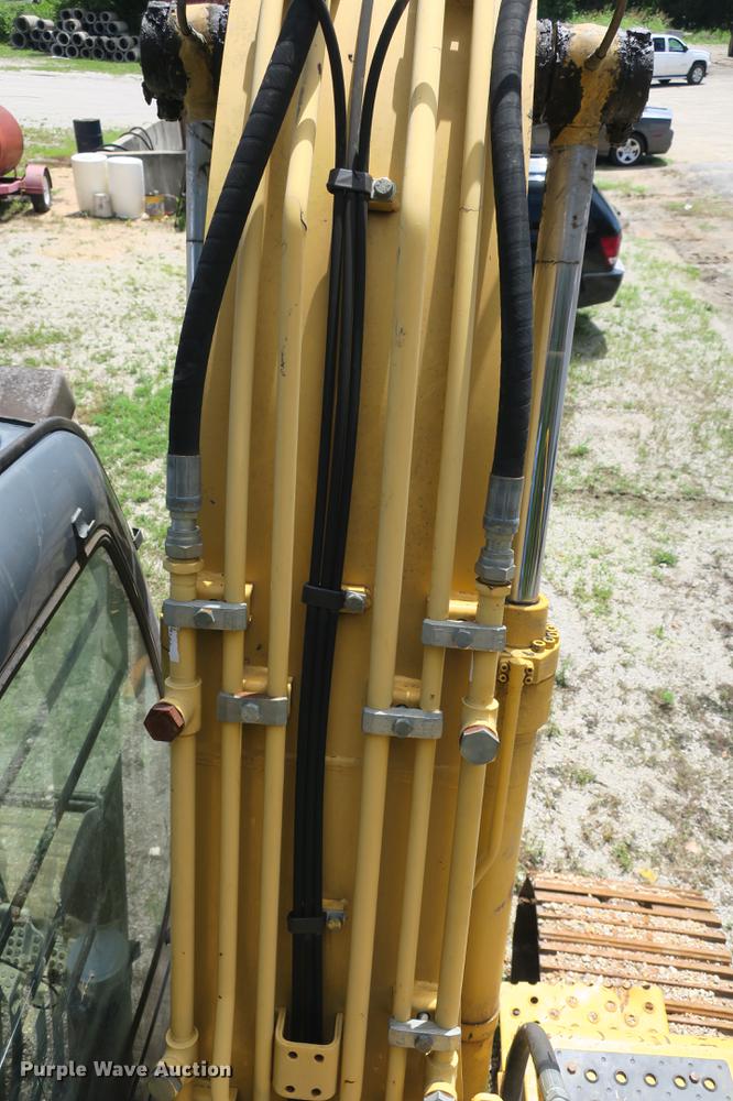 image for item DE3744 2004 John Deere 120C excavator