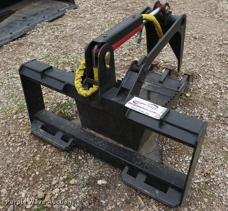 image for item DD7703 Stump bucket with grapple skid steer attachment