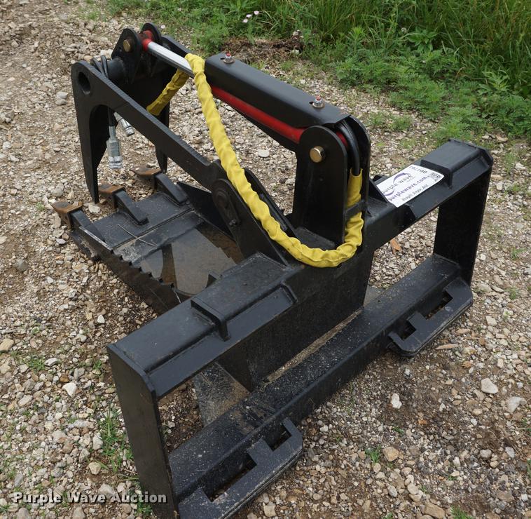 image for item DD7703 Stump bucket with grapple skid steer attachment