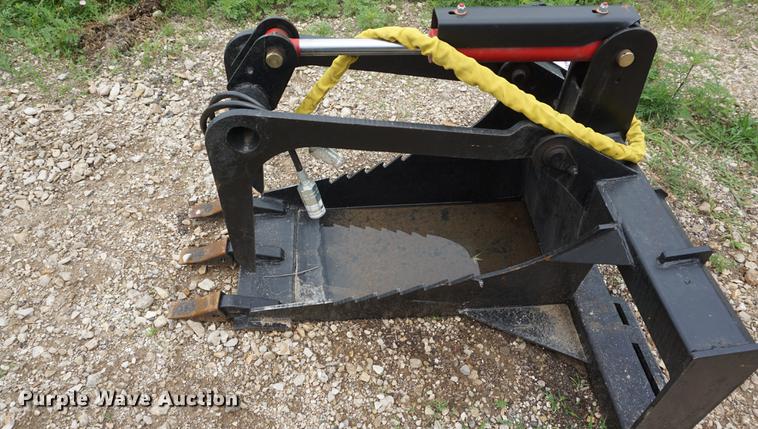 image for item DD7703 Stump bucket with grapple skid steer attachment