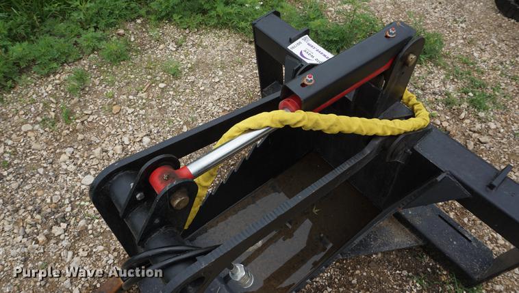 image for item DD7703 Stump bucket with grapple skid steer attachment