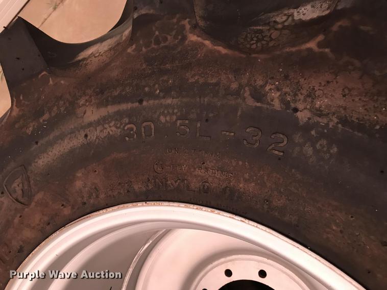 image for item G1219 (2) Firestone Champion Spade Grip 30.5L-32 R-2 tires