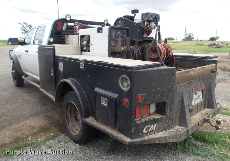 image for item DD1164 2014 Dodge Ram 5500 Crew Cab flatbed truck