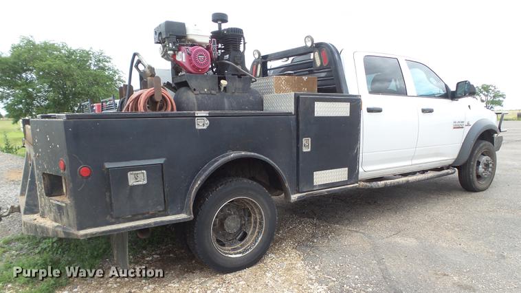 image for item DD1164 2014 Dodge Ram 5500 Crew Cab flatbed truck